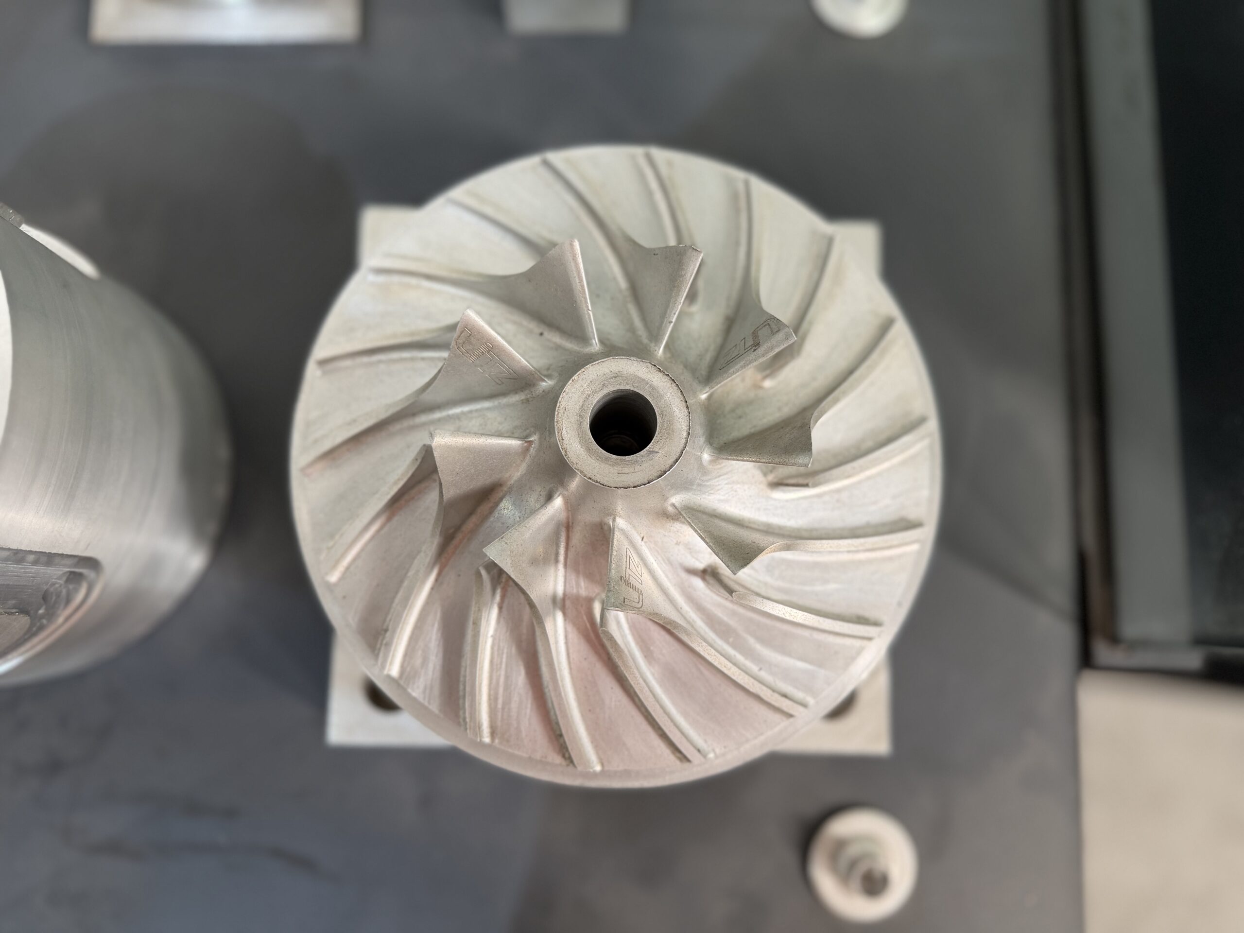 Sample impeller with curved blades, an example of 5 axis machined parts